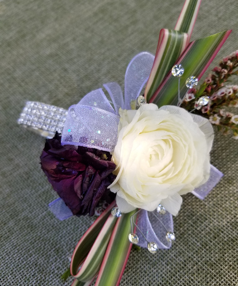 Burgundy Ranunculus Iridescent accent Wrist Corsage