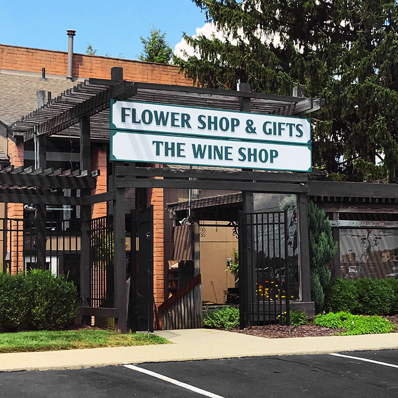 An exterior view of our classic Flower and Wine Shop