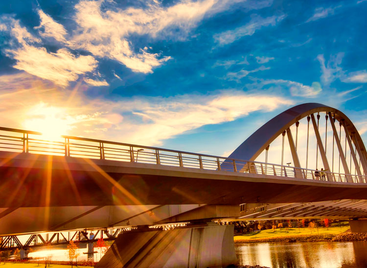 A sunset view of the Main Street Bridge